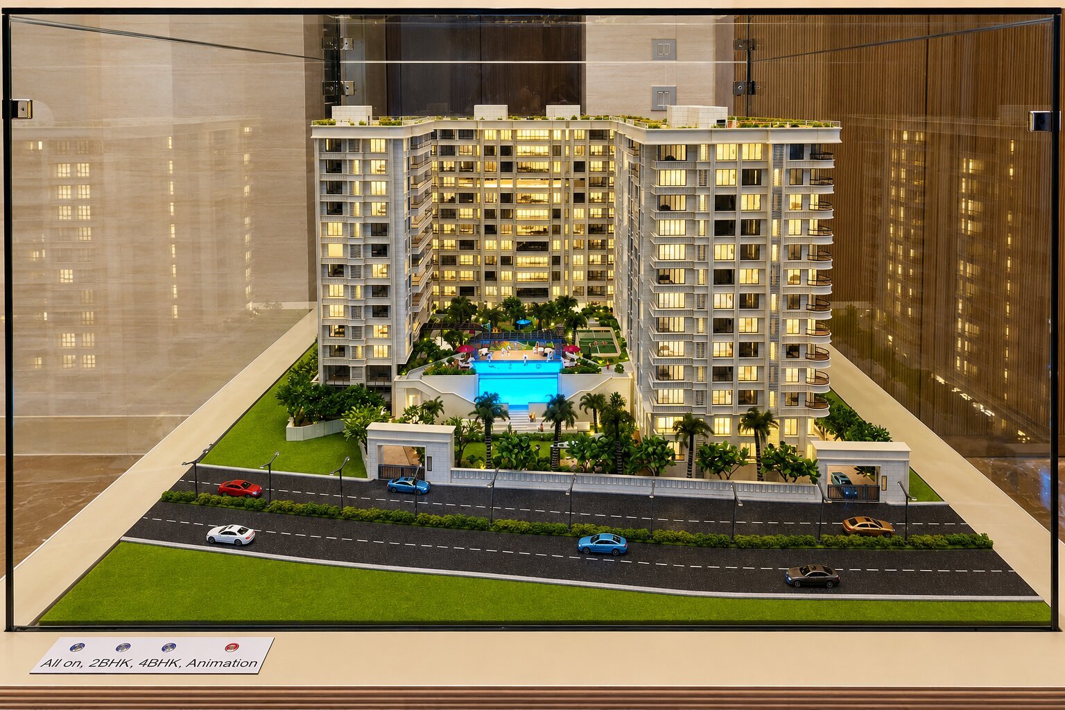 3D commercial architectural model showing detailed facade, entrance plaza, parking and landscape elements