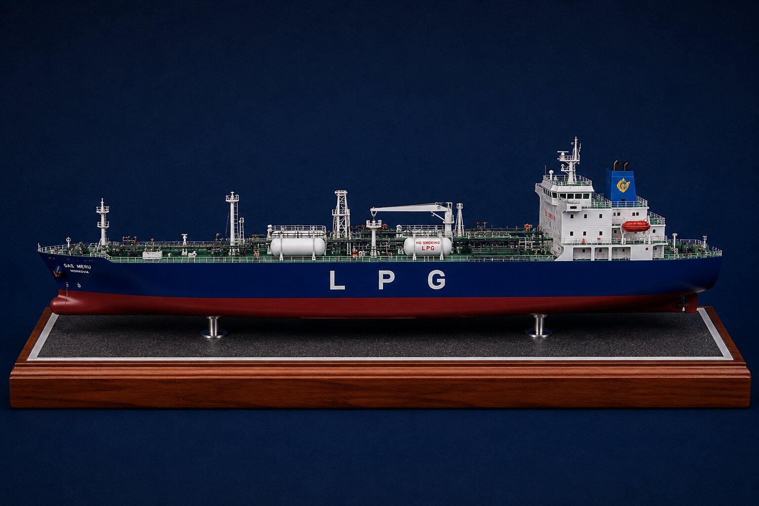 Detailed LPG carrier ship model showing specialized cargo containment, deck-mounted equipment, transfer manifold, service piping, navigation superstructure, mooring fittings, and realistic hull