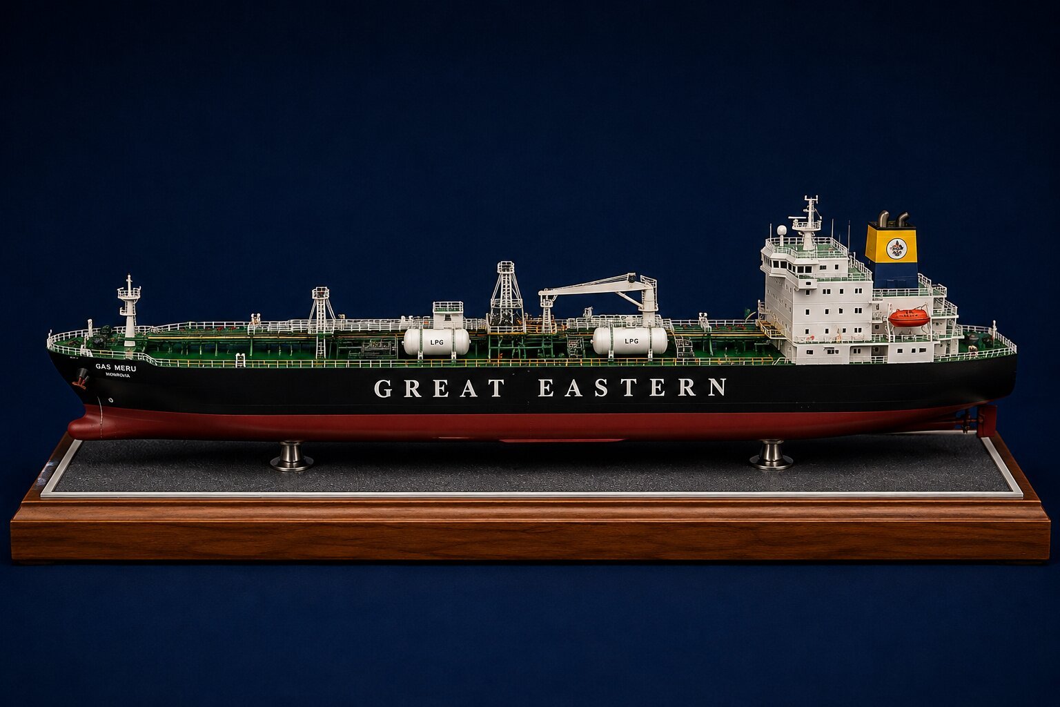 Detailed commercial ship model with realistic hull, deck, bridge, cargo area and miniature marine components