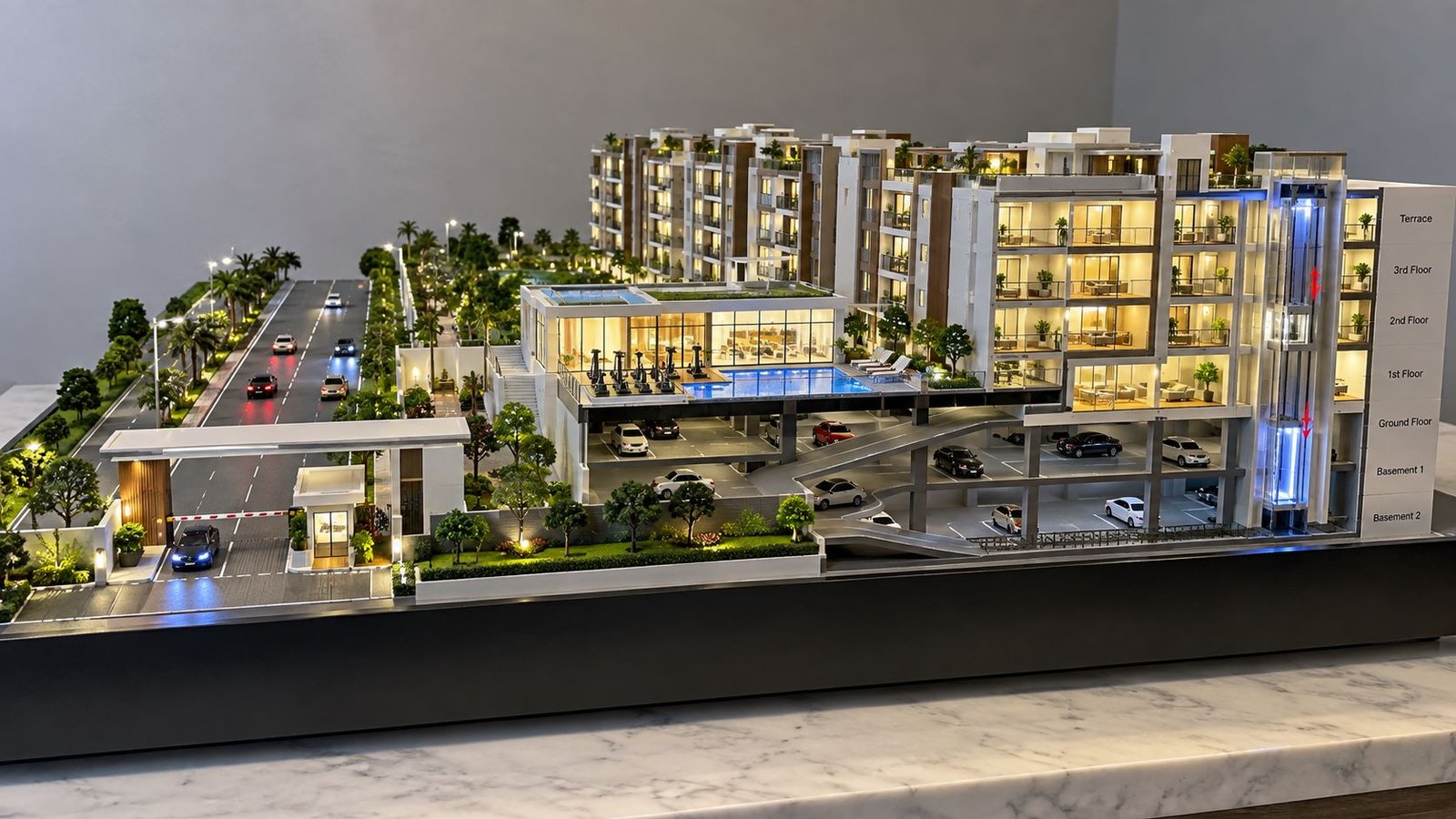 Detailed working architectural model with hydraulic lift, moving cars and LED lighting