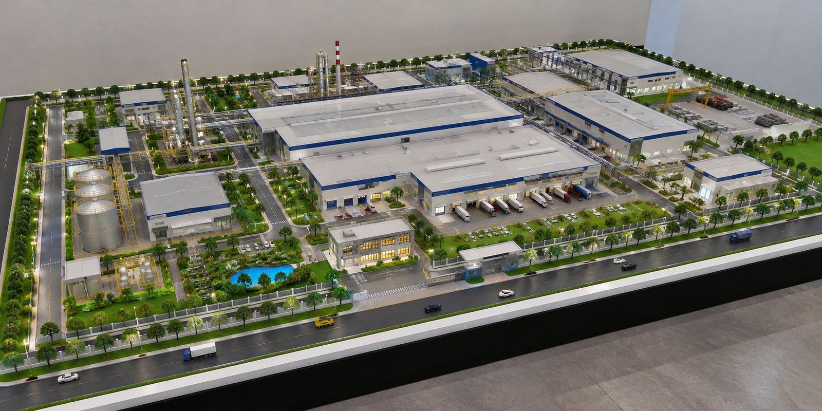 Detailed manufacturing plant model with factories, warehouses, process equipment and industrial roads
